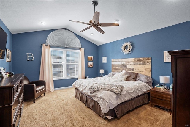 carpeted bedroom featuring ceiling fan and lofted ceiling