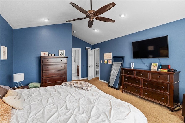 bedroom with lofted ceiling, light colored carpet, and ceiling fan