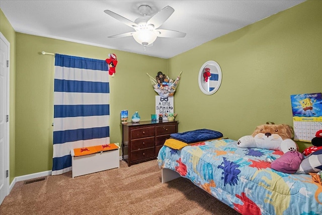 carpeted bedroom with ceiling fan