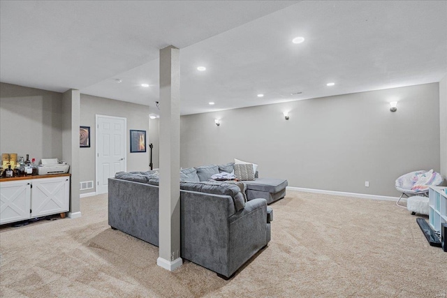 living room with light colored carpet