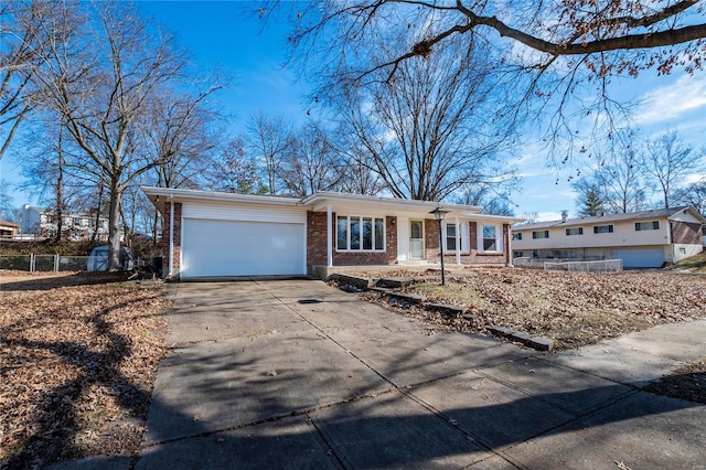 single story home with a garage