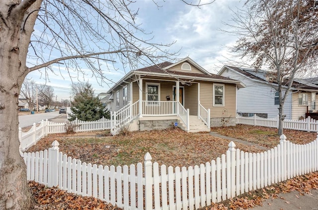 bungalow-style home with a porch