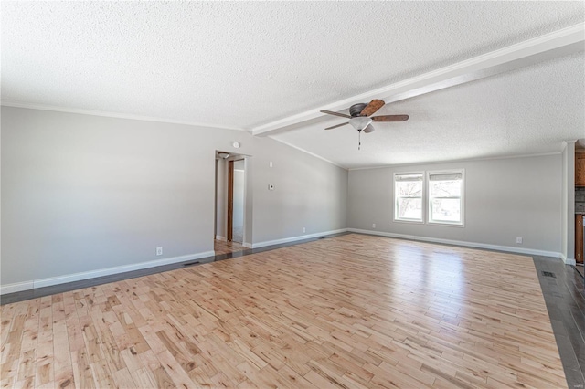 unfurnished room with lofted ceiling, crown molding, light hardwood / wood-style flooring, a textured ceiling, and ceiling fan