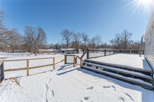 view of yard covered in snow