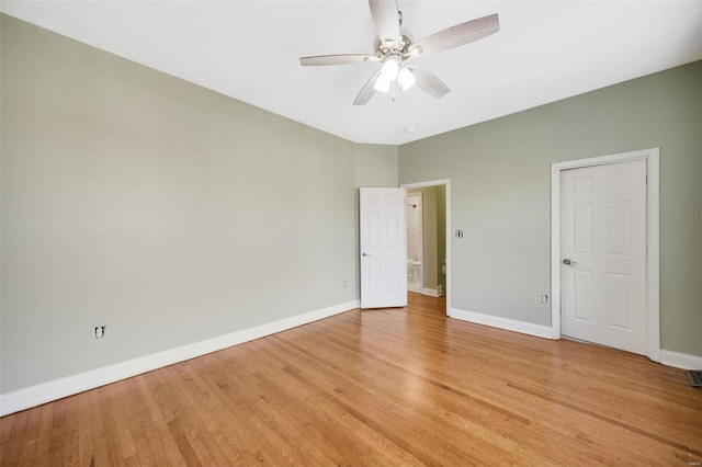 unfurnished room featuring ceiling fan and light wood-type flooring