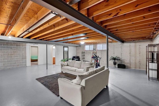 living room with concrete flooring