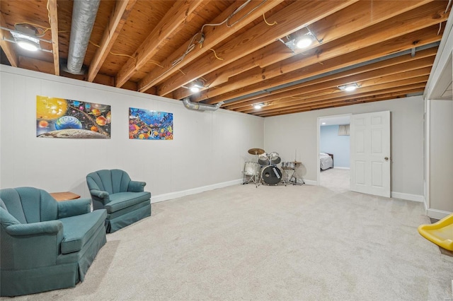 sitting room featuring light carpet