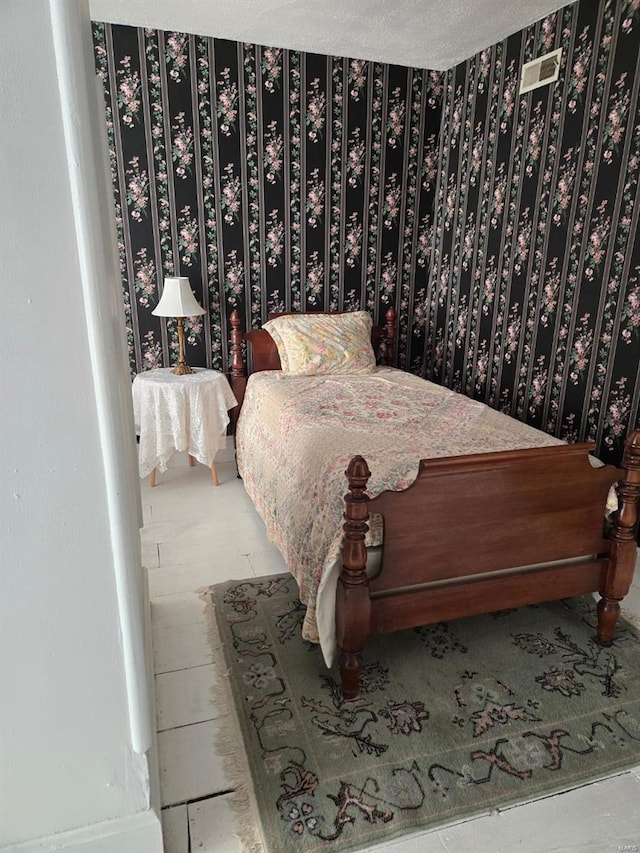 bedroom with a textured ceiling