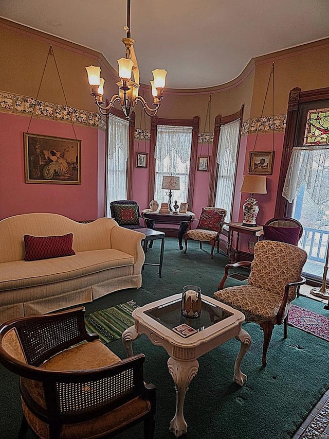 carpeted living room featuring ornamental molding and an inviting chandelier