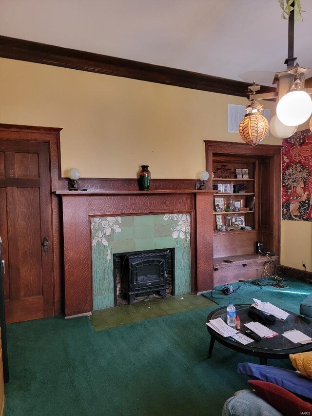 carpeted living room featuring ornamental molding