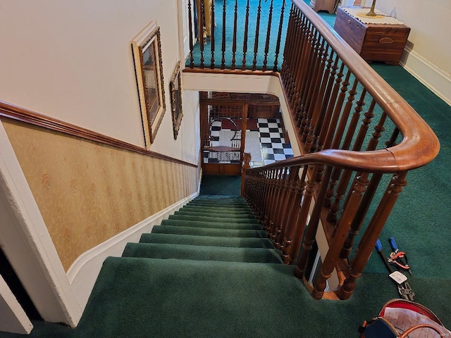 staircase with carpet flooring