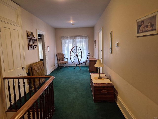 hallway with dark carpet