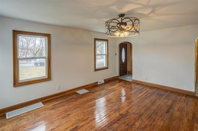 empty room featuring hardwood / wood-style floors