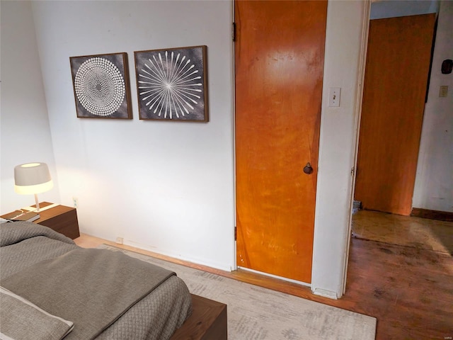 bedroom featuring wood-type flooring