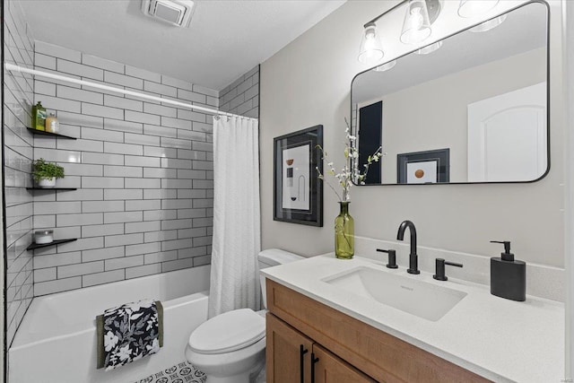 full bathroom featuring vanity, toilet, and shower / tub combo with curtain