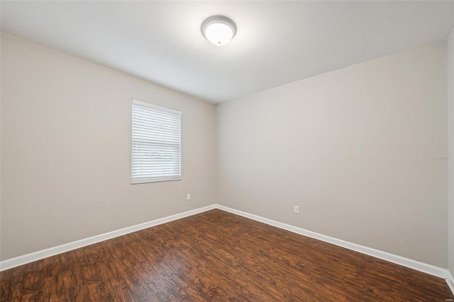 empty room with wood-type flooring