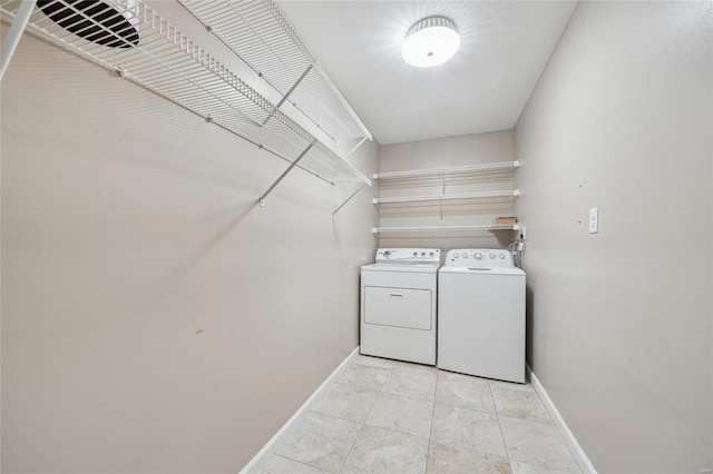 washroom with light tile patterned flooring and independent washer and dryer