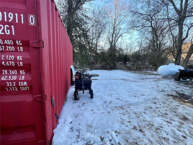 view of yard covered in snow