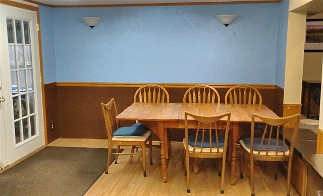 dining space with light wood-type flooring