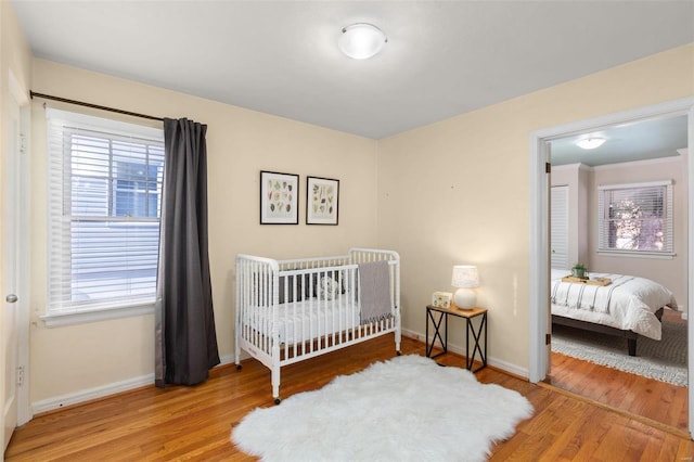 bedroom featuring hardwood / wood-style flooring