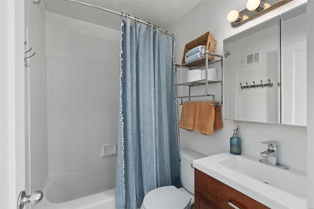 full bathroom featuring shower / bath combination with curtain, vanity, and toilet