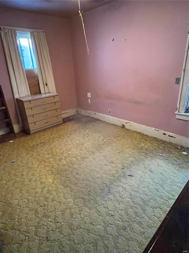 unfurnished bedroom with carpet