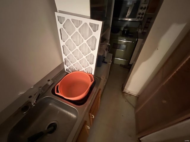 interior space featuring a sink and stove