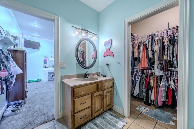 bathroom with vanity and tile patterned flooring