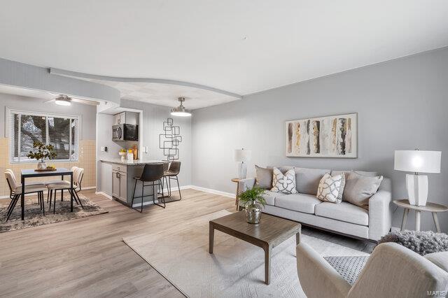 living room with light wood-type flooring