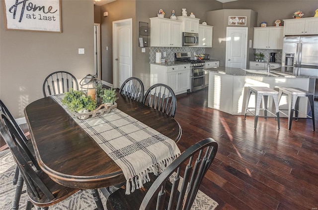 dining room featuring dark hardwood / wood-style flooring