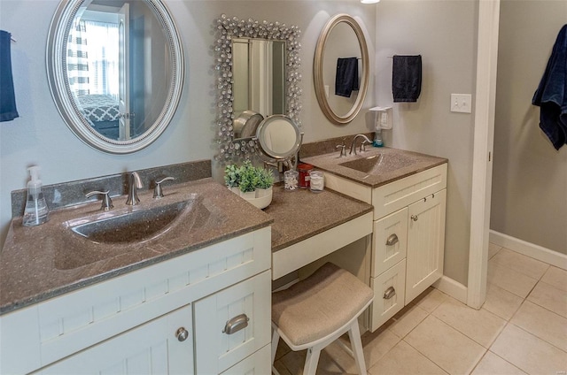 bathroom featuring vanity and tile patterned floors