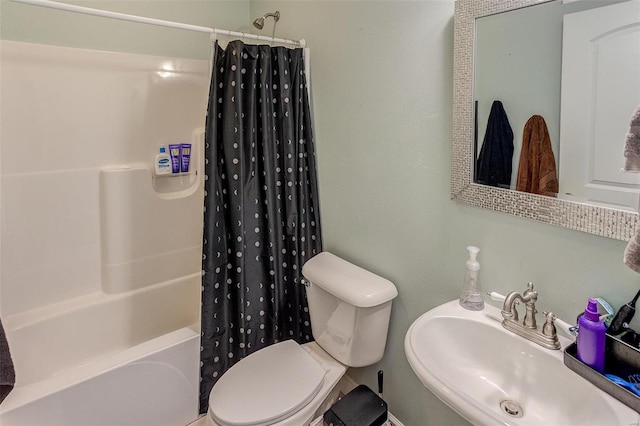 full bathroom featuring sink, toilet, and shower / bath combo