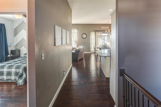 hallway featuring dark hardwood / wood-style flooring