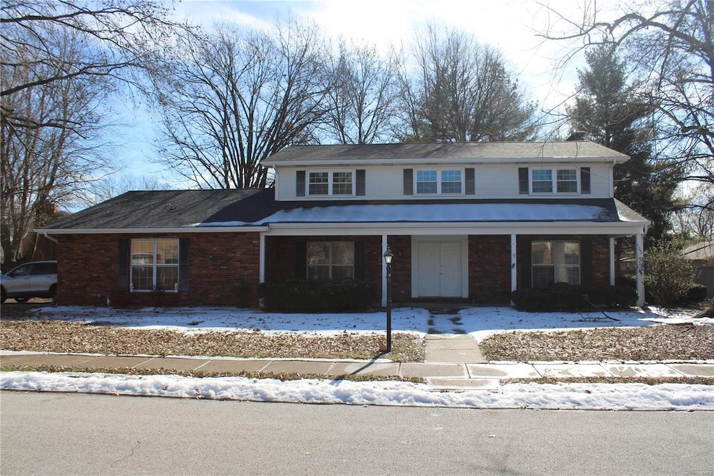 view of property featuring a porch