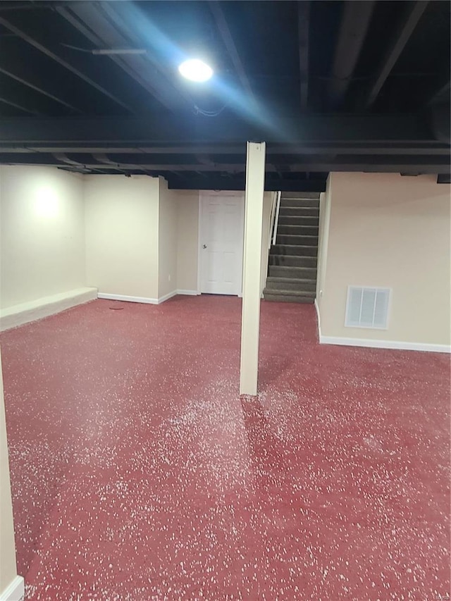 basement featuring carpet