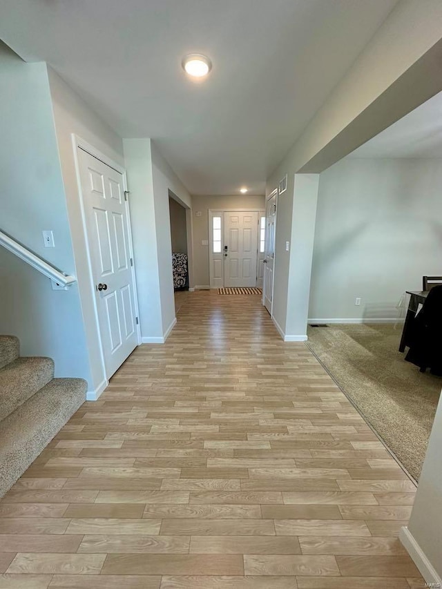 hall featuring light hardwood / wood-style floors