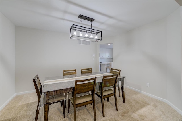 view of carpeted dining room