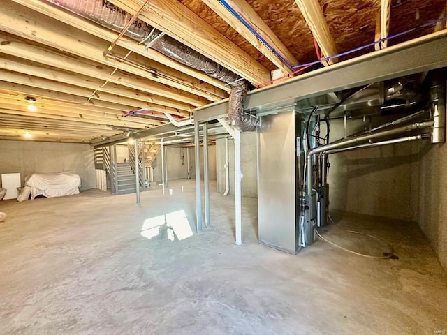 basement featuring heating unit