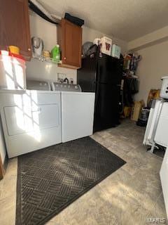 laundry room with washer and dryer