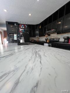 kitchen with stainless steel electric stove