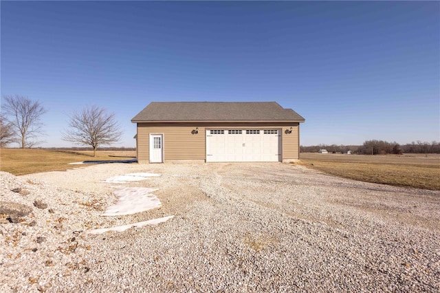 garage with a rural view