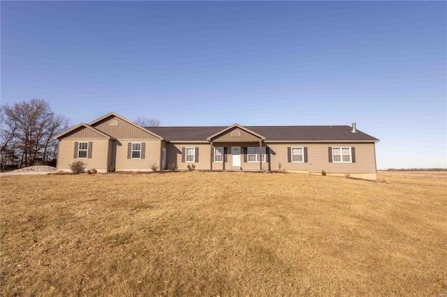 ranch-style home with a front yard