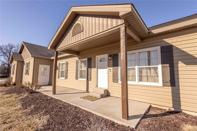 property entrance with a patio