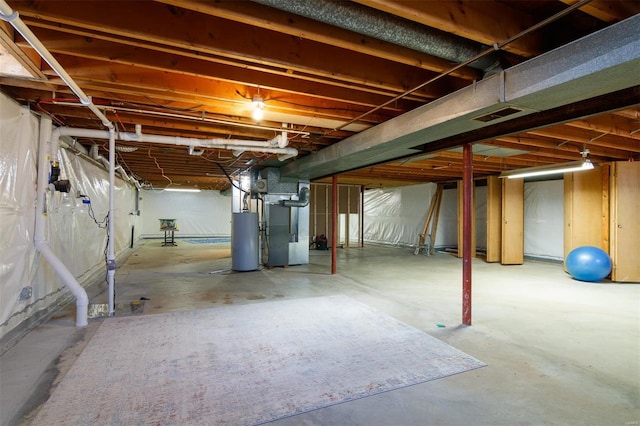 basement with heating unit and water heater