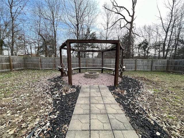 view of patio / terrace with an outdoor fire pit