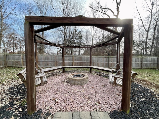 view of yard featuring a fire pit