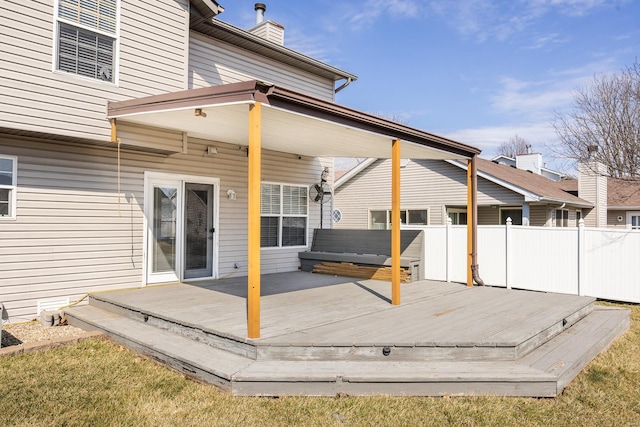 wooden deck featuring fence