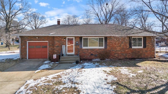 single story home with a garage