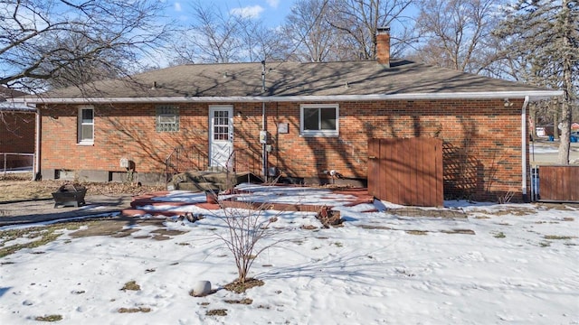 view of snow covered property