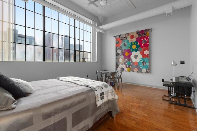 bedroom featuring wood-type flooring